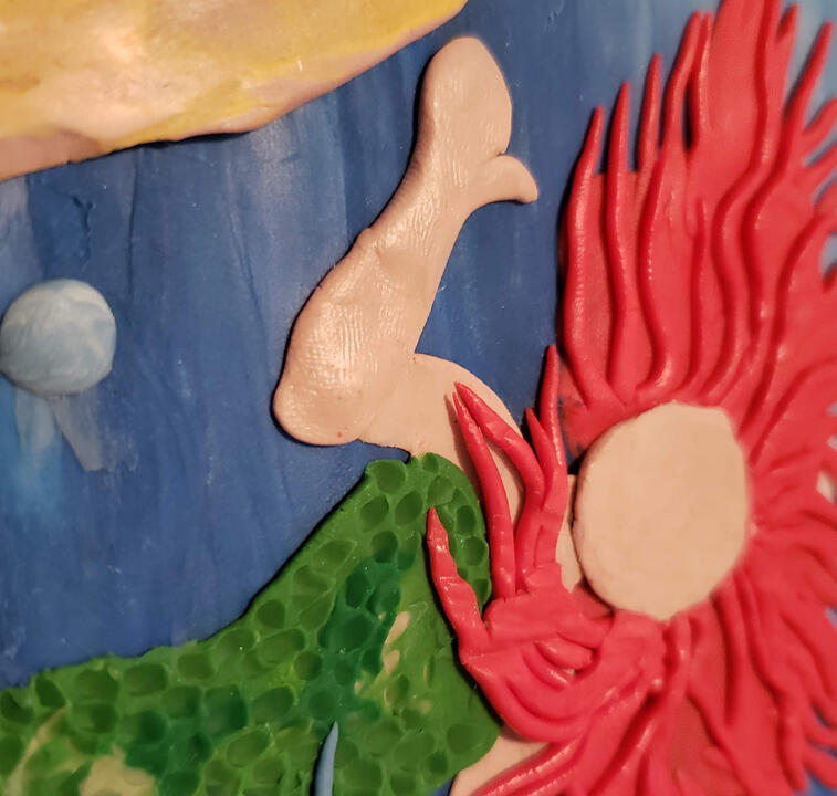 Plasticine illustration of a mermaid princess in the ocean